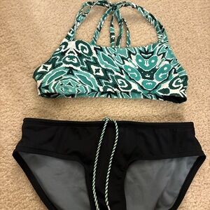 Jolyn Clothing Teal Patterned Bikini Top and Black Bottom